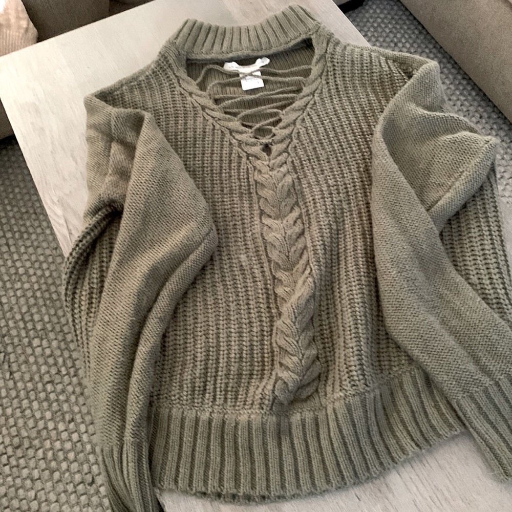 Turtleneck sweater with cutout
